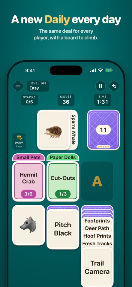 A Daily Challenge in play, with picture cards of a hedgehog and a wolf and the Small Pets and Paper Dolls piles.